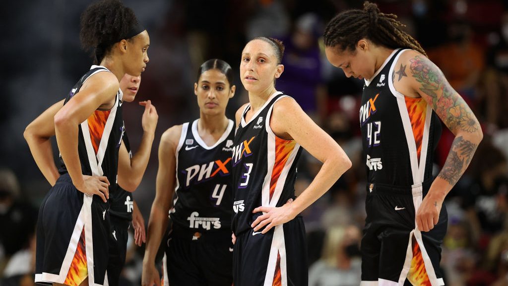 Diana Taurasi #3 (C) of the Phoenix Mercury stands with teammates during a break from the first hal...