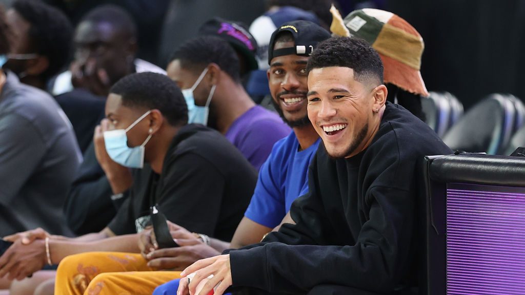 Phoenix Suns players, Chris Paul and Devin Booker attend Game Four of the 2021 WNBA semifinals betw...