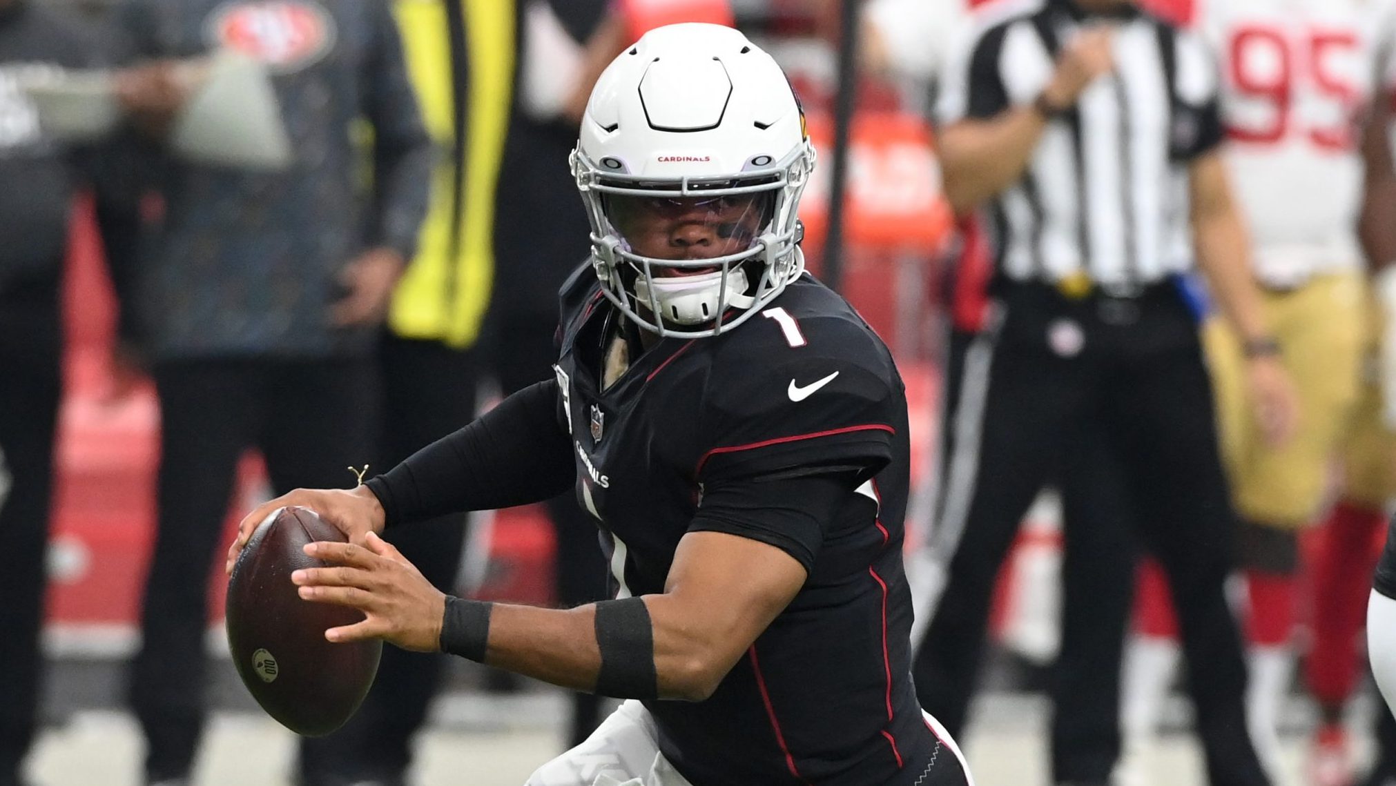 Kyler Murray #1 of the Arizona Cardinals looks to throw the ball against the San Francisco 49ers at...