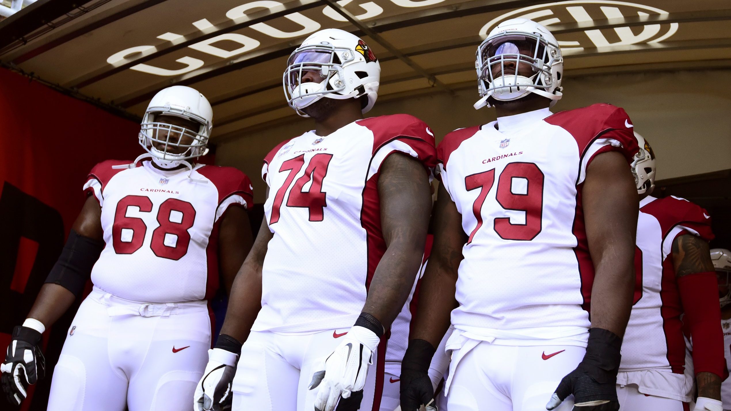 The Arizona Cardinals prepare to take the field for a game against the Cleveland Browns at FirstEne...