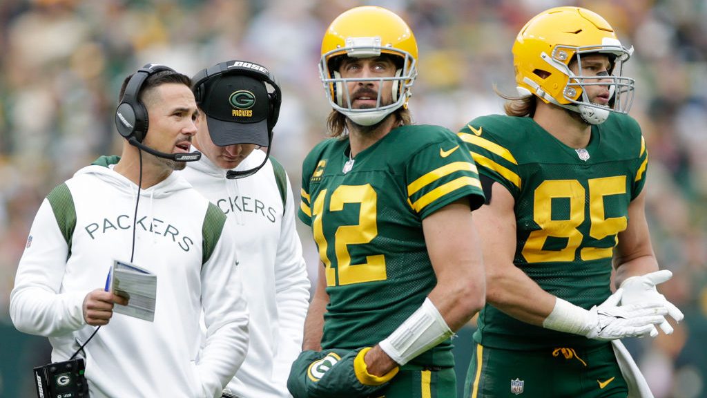 Head coach Matt LaFleur of the Green Bay Packers and Aaron Rodgers #12 meet in the fourth quarter a...