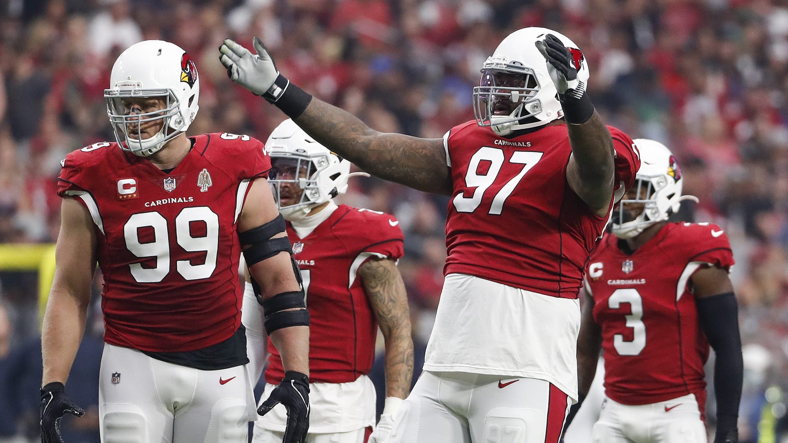 Jordan Phillips #97 of the Arizona Cardinals reacts in the first quarter against the Houston Texans...