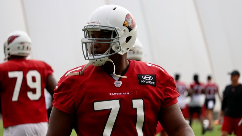 Cardinals OL Justin Murray warms up ahead of practice Friday, Sept. 24, 2021, in Tempe. (Tyler Drak...