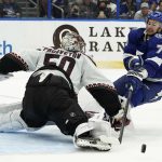Arizona Coyotes goaltender Ivan Prosvetov (50)makes a pad save on a shot by Tampa Bay Lightning center Anthony Cirelli (71) during the second period of an NHL hockey game Thursday, Oct. 28, 2021, in Tampa, Fla. (AP Photo/Chris O'Meara)