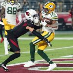 Green Bay Packers wide receiver Randall Cobb (18) pulls in a touchdown pass as Arizona Cardinals cornerback Byron Murphy (7) defends during the second half of an NFL football game, Thursday, Oct. 28, 2021, in Glendale, Ariz. (AP Photo/Ross D. Franklin)