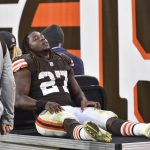 Cleveland Browns running back Kareem Hunt (27) is carted off the field after an injury during the second half of an NFL football game against the Arizona Cardinals, Sunday, Oct. 17, 2021, in Cleveland. (AP Photo/David Richard)