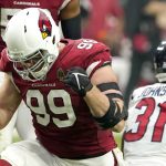 Arizona Cardinals defensive end J.J. Watt (99) celebrates after a tackle against the Houston Texans during the first half of an NFL football game, Sunday, Oct. 24, 2021, in Glendale, Ariz. (AP Photo/Darryl Webb)