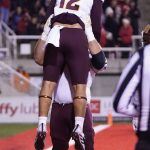Arizona State's Jalin Conyers is lifted after scoring against Utah during the first half of an NCAA college football game Saturday, Oct. 16, 2021, in Salt Lake City. (AP Photo/Rick Bowmer)