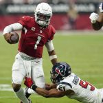 Arizona Cardinals quarterback Kyler Murray (1) runs as Houston Texans outside linebacker Kamu Grugier-Hill (51) makes the tackle during the first half of an NFL football game, Sunday, Oct. 24, 2021, in Glendale, Ariz. (AP Photo/Ross D. Franklin)