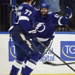 Tampa Bay Lightning left wing Alex Killorn (17) celebrates his goal against the Arizona Coyotes with defenseman Victor Hedman (77) during the first period of an NHL hockey game Thursday, Oct. 28, 2021, in Tampa, Fla. (AP Photo/Chris O'Meara)
