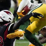 Arizona Cardinals running back Jonathan Ward (29) collides with Green Bay Packers running back Kylin Hill during the second half of an NFL football game, Thursday, Oct. 28, 2021, in Glendale, Ariz. Both players left the game after the hit. (AP Photo/Ross D. Franklin)