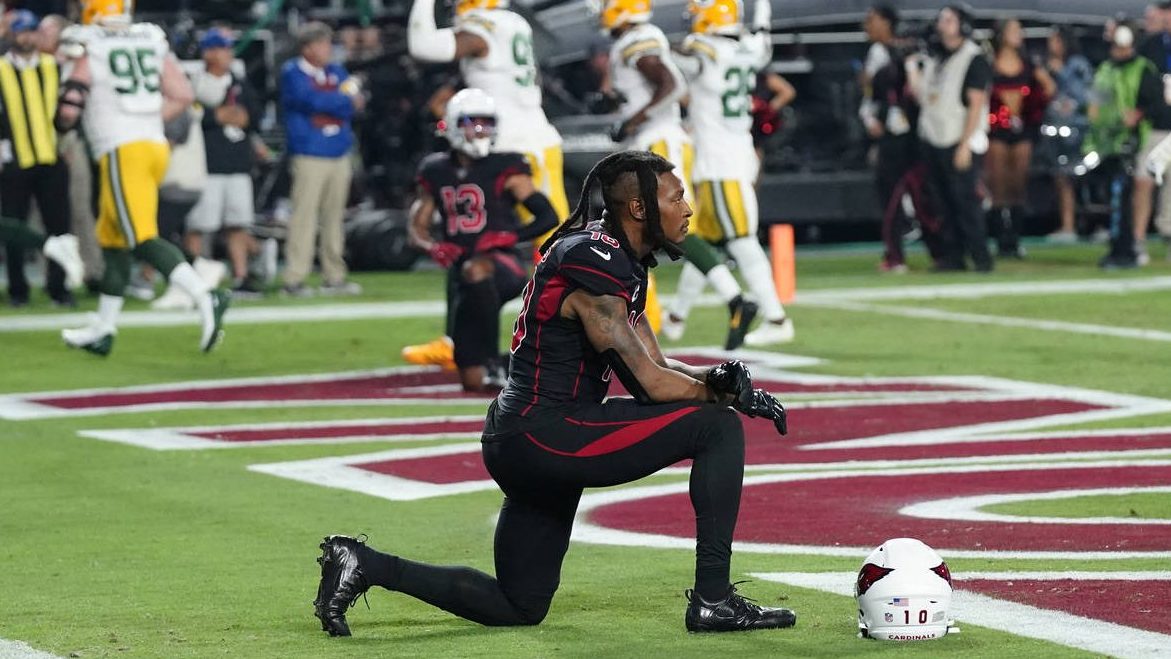 Arizona Cardinals wide receiver DeAndre Hopkins (10) kneels after the Green Bay Packers intercepted...