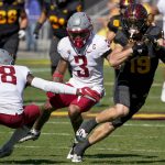 Arizona State's Ricky Pearsall (19) makes Washington State defensive backs George Hicks III (18) and Daniel Isom (3) miss during the first half of an NCAA college football game, Saturday, Oct 30, 2021, in Tempe, Ariz. (AP Photo/Darryl Webb)