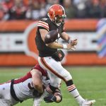 Arizona Cardinals defensive end J.J. Watt (99) tackles Cleveland Browns quarterback Baker Mayfield (6) as Mayfield fumbles during the second half of an NFL football game, Sunday, Oct. 17, 2021, in Cleveland. Mayfield was injured on the play. (AP Photo/David Richard)