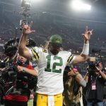 Green Bay Packers quarterback Aaron Rodgers (12) celebrates after an NFL football game against the Arizona Cardinals, Thursday, Oct. 28, 2021, in Glendale, Ariz. The Packers won 24-21. (AP Photo/Ross D. Franklin)