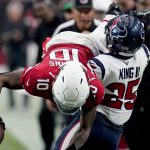 Arizona Cardinals wide receiver DeAndre Hopkins (10) is tackled by Houston Texans defensive back Desmond King (25) during the second half of an NFL football game, Sunday, Oct. 24, 2021, in Glendale, Ariz. (AP Photo/Ross D. Franklin)