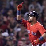Boston Red Sox's Kyle Schwarber celebrates his solo homer in the third inning of an American League Wild Card playoff baseball game against the New York Yankees at Fenway Park, Tuesday, Oct. 5, 2021, in Boston. (AP Photo/Charles Krupa)
