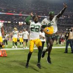 Green Bay Packers cornerback Shemar Jean-Charles (22) and cornerback Eric Stokes (21) celebrate after an NFL football game against the Arizona Cardinals, Thursday, Oct. 28, 2021, in Glendale, Ariz. The Packers won 24-21. (AP Photo/Ross D. Franklin)