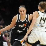 Phoenix Mercury guard Diana Taurasi drives on Chicago Sky guard Allie Quigley (14) during the first half of Game 2 of basketball's WNBA Finals, Wednesday, Oct. 13, 2021, in Phoenix. (AP Photo/Rick Scuteri)