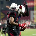Arizona Cardinals running back James Conner (6) celebrates his touchdown against the Green Bay Packers during the second half of an NFL football game, Thursday, Oct. 28, 2021, in Glendale, Ariz. (AP Photo/Ross D. Franklin)