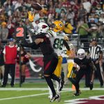 Arizona Cardinals cornerback Byron Murphy (7) breaks up a pass intended for Green Bay Packers wide receiver Juwann Winfree (88) during the first half of an NFL football game, Thursday, Oct. 28, 2021, in Glendale, Ariz. (AP Photo/Ross D. Franklin)