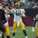 Green Bay Packers quarterback Aaron Rodgers (12) throws against the Arizona Cardinals during the first half of an NFL football game, Thursday, Oct. 28, 2021, in Glendale, Ariz. (AP Photo/Rick Scuteri)