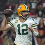 Green Bay Packers quarterback Aaron Rodgers (12) throws during the first half of an NFL football game against the Arizona Cardinals, Thursday, Oct. 28, 2021, in Glendale, Ariz. (AP Photo/Rick Scuteri)