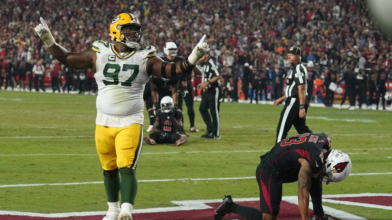 Green Bay Packers nose tackle Kenny Clark (97) celebrates after a turnover against the Arizona Card...