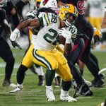 Green Bay Packers running back A.J. Dillon (28) during the first half of an NFL football game against the Arizona Cardinals, Thursday, Oct. 28, 2021, in Glendale, Ariz. (AP Photo/Ross D. Franklin)