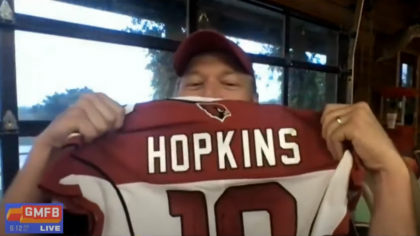 Country music superstar Blake Shelton poses with his DeAndre Hopkins jersey on GMFB. (Screenshot)...