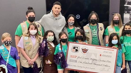 Devin Booker surprises Girl Scouts with $100K grant at Mercury game