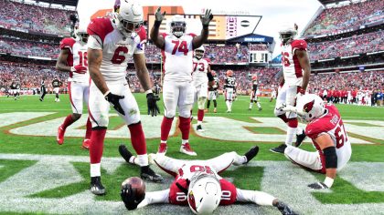 DeAndre Hopkins #10 of the Arizona Cardinals celebrates a touchdown with teammates during the third...