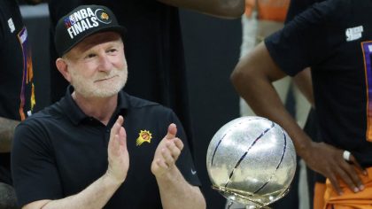 Owner Robert Sarver stands with the Western Conference Championship trophy after the Suns beat the ...