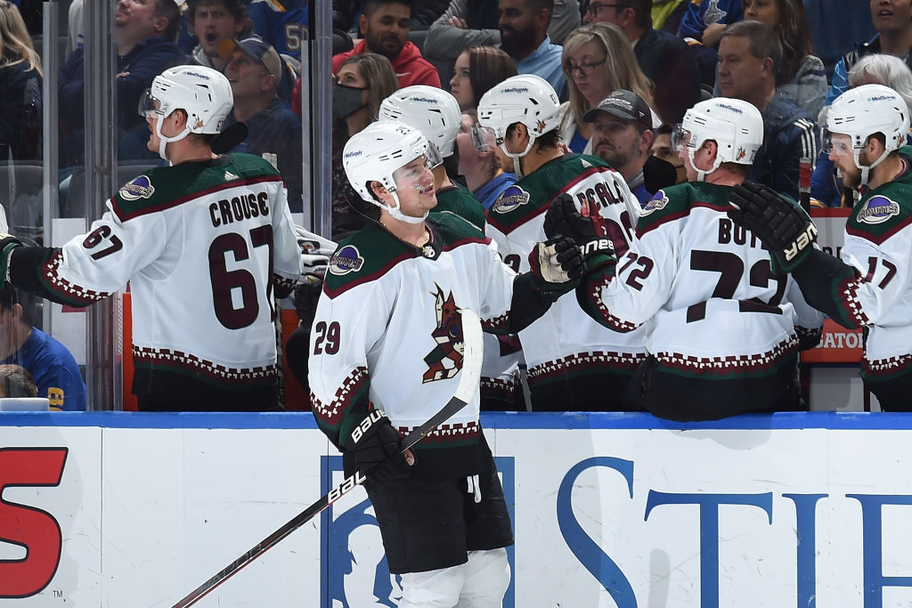 Barrett Hayton #29 of the Arizona Coyotes is congratulated after scoring a goal against the St. Lou...