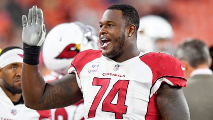 D.J. Humphries #74 of the Arizona Cardinals waves to the crowd in the fourth quarter against the Cl...