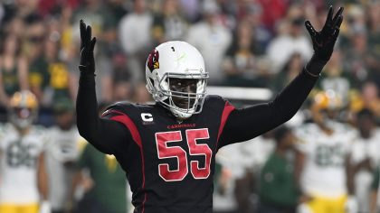 Chandler Jones #55 of the Arizona Cardinals pumps up the crowd against the Green Bay Packers at Sta...