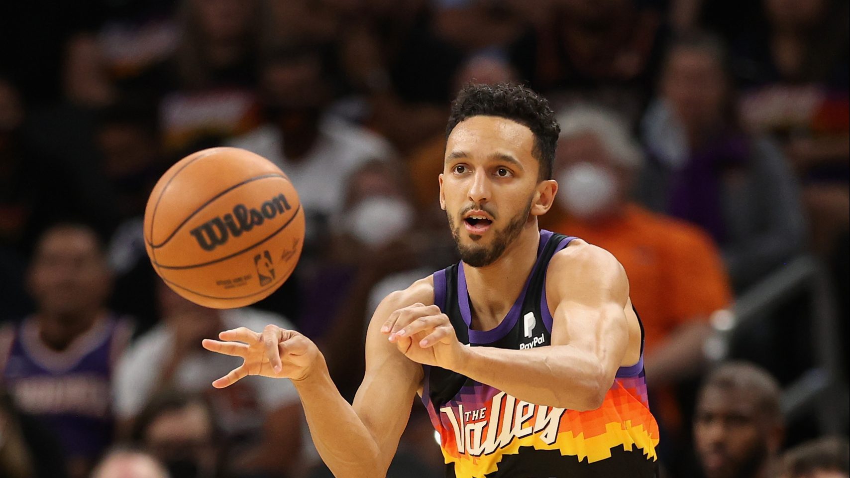 Landry Shamet #14 of the Phoenix Suns passes the ball during the first half of the NBA game at Foot...