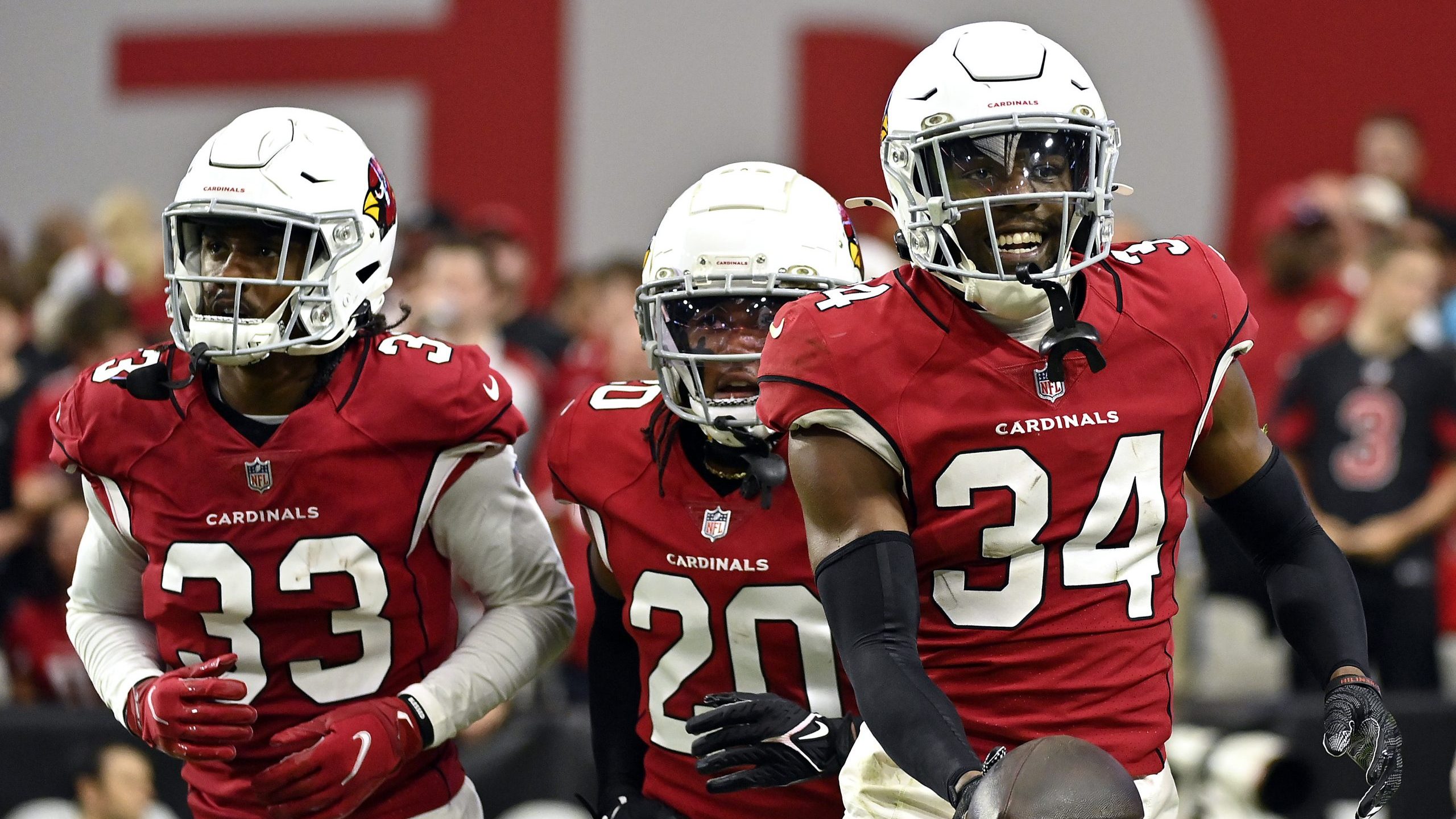 Jalen Thompson #34 of the Arizona Cardinals looks on after making an interception against the Carol...