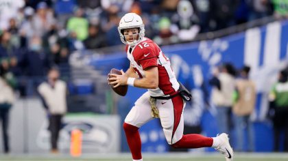 Colt McCoy #12 of the Arizona Cardinals looks to pass against the Seattle Seahawks during the secon...