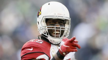 Chandler Jones #55 of the Arizona Cardinals reacts after his tackle against the Seattle Seahawks du...