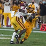 Arizona State defensive back Chase Lucas (24) breaks up a pass intended for Southern California receiver Tahj Washington (16) during the second half of an NCAA college football game Saturday, Nov. 6, 2021, in Tempe, Ariz. (AP Photo/Darryl Webb)