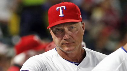 FILE - Texas Rangers manager Jeff Banister watches from the dugout during the seventh inning of a b...