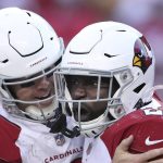 Arizona Cardinals running back Eno Benjamin, right, celebrates with quarterback Colt McCoy after scoring against the San Francisco 49ers during the second half of an NFL football game in Santa Clara, Calif., Sunday, Nov. 7, 2021. (AP Photo/Jed Jacobsohn)