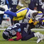 Los Angeles Rams running back Darrell Henderson, above, is brought down by Tennessee Titans inside linebacker Jayon Brown, below, during the first half of an NFL football game Sunday, Nov. 7, 2021, in Inglewood, Calif. (AP Photo/Marcio Jose Sanchez)
