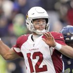 Arizona Cardinals Colt McCoy throws against the Seattle Seahawks during the second half of an NFL football game, Sunday, Nov. 21, 2021, in Seattle. (AP Photo/Ted S. Warren)