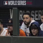 Members of the Houston Astros watch during the ninth inning in Game 6 of baseball's World Series between the Houston Astros and the Atlanta Braves Tuesday, Nov. 2, 2021, in Houston. (AP Photo/Eric Gay)