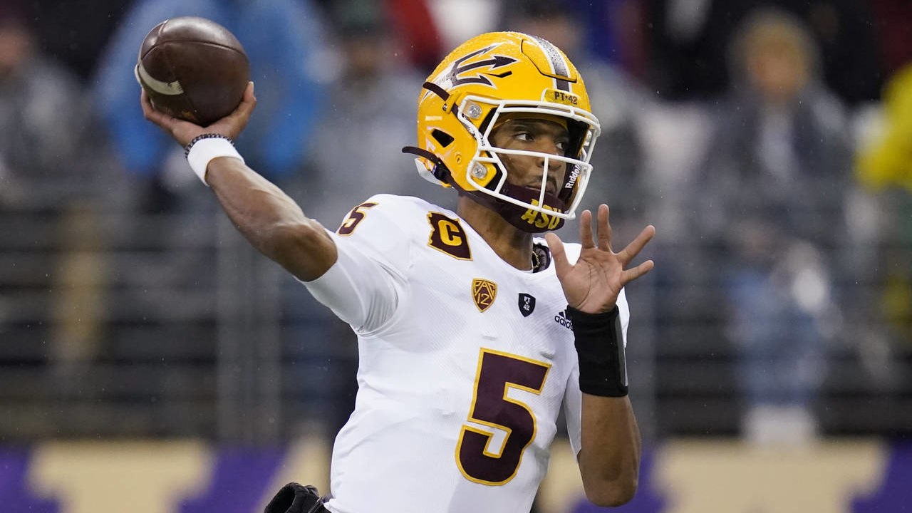 Arizona State quarterback Jayden Daniels throws a pass against Washington during the first half of ...