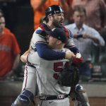 Atlanta Braves relief pitcher Will Smith and catcher Travis d'Arnaud celebrate after winning baseball's World Series in Game 6 against the Houston Astros Tuesday, Nov. 2, 2021, in Houston. The Braves won 7-0. (AP Photo/Sue Ogrocki)