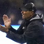Arizona State coach Herm Edwards applauds the team during the second half of an NCAA college football game against Washington on Saturday, Nov. 13, 2021, in Seattle. Arizona State won 35-30. (AP Photo/Elaine Thompson)