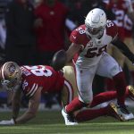 Arizona Cardinals middle linebacker Jordan Hicks (58) recovers a fumble by San Francisco 49ers tight end George Kittle, rear, during the first half of an NFL football game in Santa Clara, Calif., Sunday, Nov. 7, 2021. (AP Photo/Jed Jacobsohn)